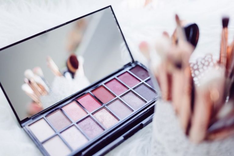 International Beauty Brands - selective focus photography of eyeshadow palette