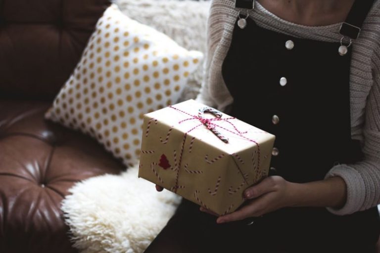 Home Decor Gifts - selective focus photography of woman holding gift box