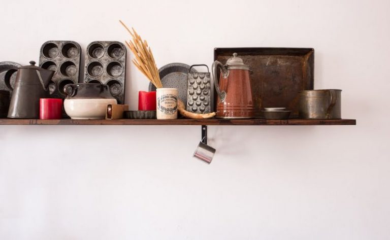 Vintage Decor Items - kitchen utensil lot on brown wooden floating shelf